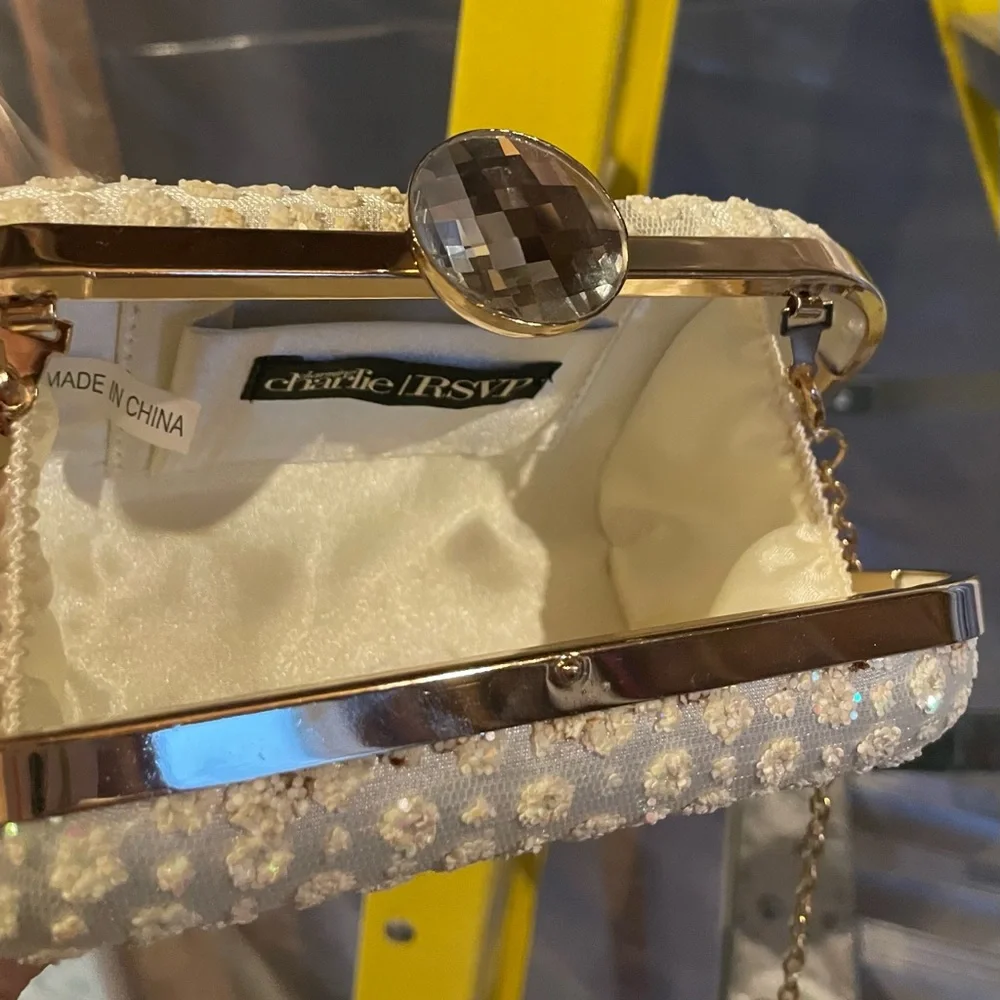 Gorgeous clutch with optional gold chain!  #CharmingCharlie